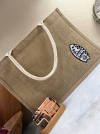 Embrace The Spectrum Burlap Tote